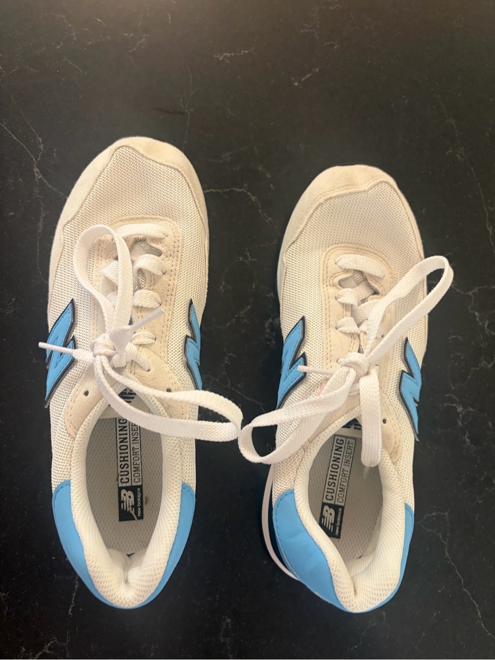New Balance White Sneakers with Blue Logo Accents